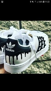 adidas superstar con scritta dietro