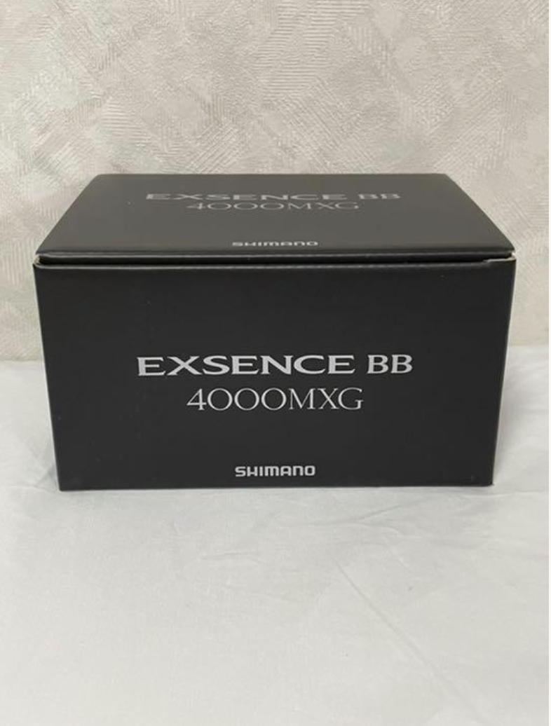 Shimano 20 Exsence BB 4000MXG Right Handle Spinning Reel in the