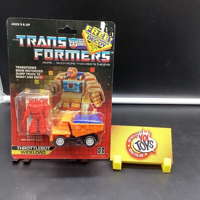 1987 MOC G1 TRANSFORMERS THROTTLEBOT WIDELOAD W/ RARE RED DECOY HOIST