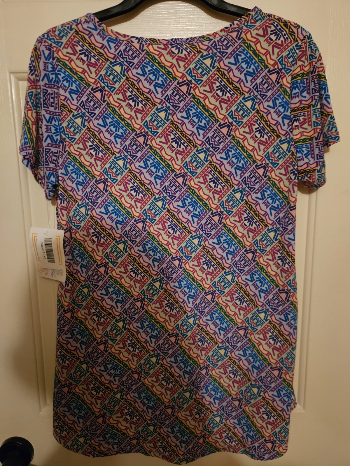Lularoe Classic Tee Pink/Blue Aztec Pattern. Sz. XS, New W/Tags