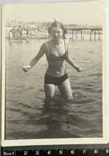 OLD PHOTO Cute young woman in bikini swimsuit on the beach