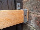 2 x storm barricade brackets to prevent gales blowining open 100x100mm profile