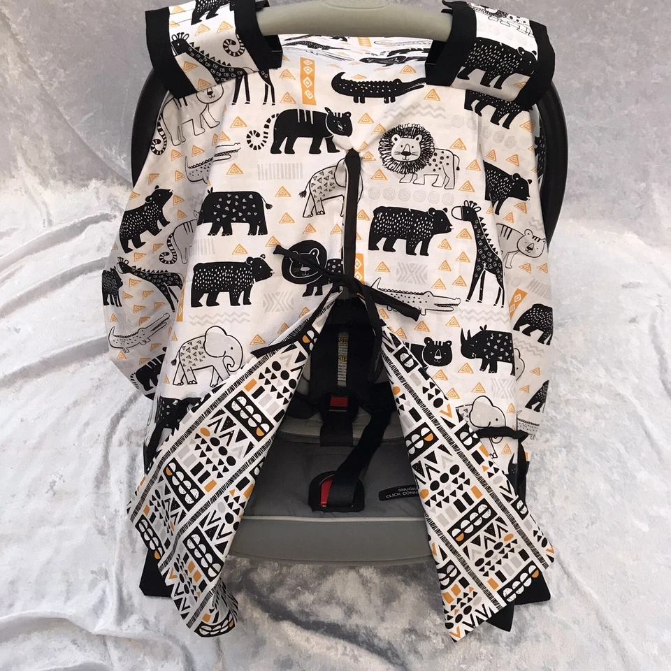 Lindo toldo/cubierta de lactancia materna para asiento de coche infantil con estampado de animales de safari Foto 2 de 4