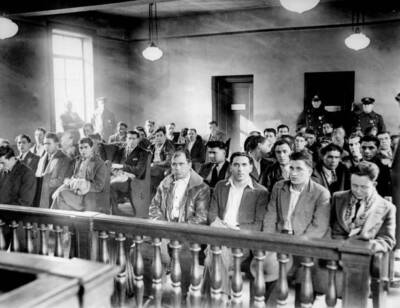 Illegal aliens wait in Newark s Third Precinct station before bein .. Old Photo