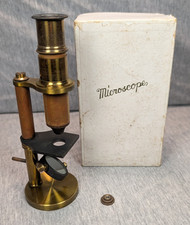 Ancien petit microscope monoculaire composé laiton et métal avec boite d'origine