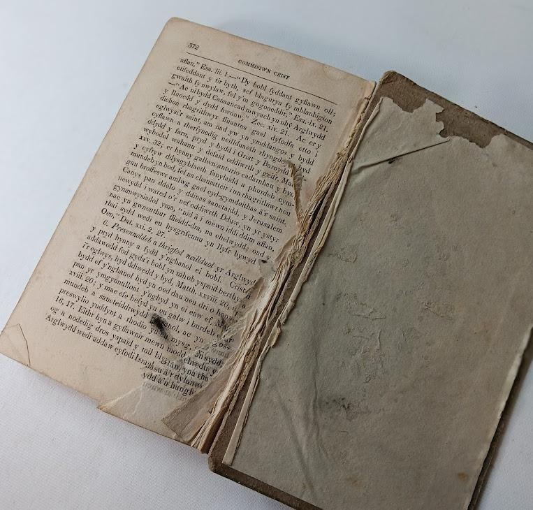 Antique welsh theological text. 'the commission' book is damaged see pictures.