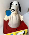 Snoopy the Jack in the Box Peanuts Mattel 1966 vintage made in USA, with black and white dog in red box with yellow background.