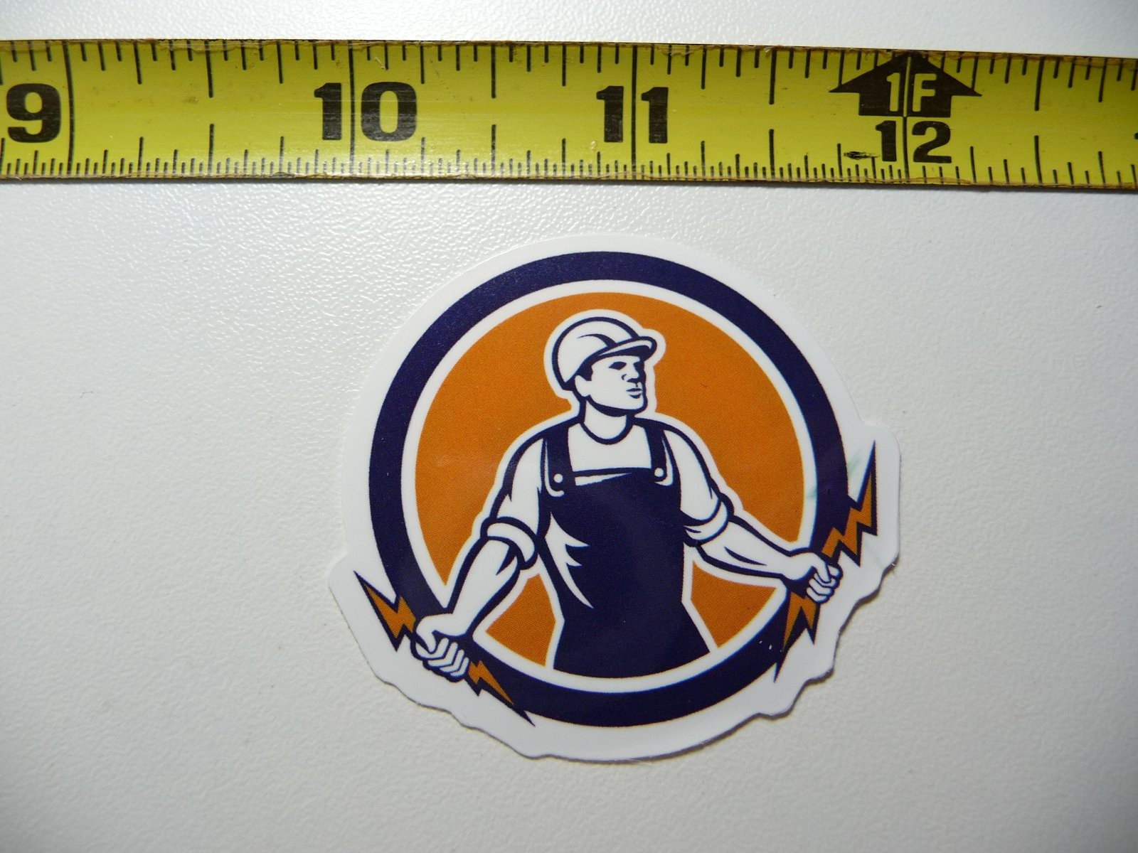 MIGHTY WORKER HOLDING LIGHTNING BOLTS DECAL STICKER WORK JOB HARD HAT PRIDE