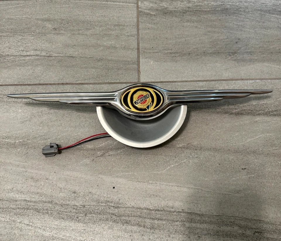 Remanufactured 05-10 PT Cruiser Electric Liftgate Trunk Hatch Handle Emblem silv - Image 2 of 4