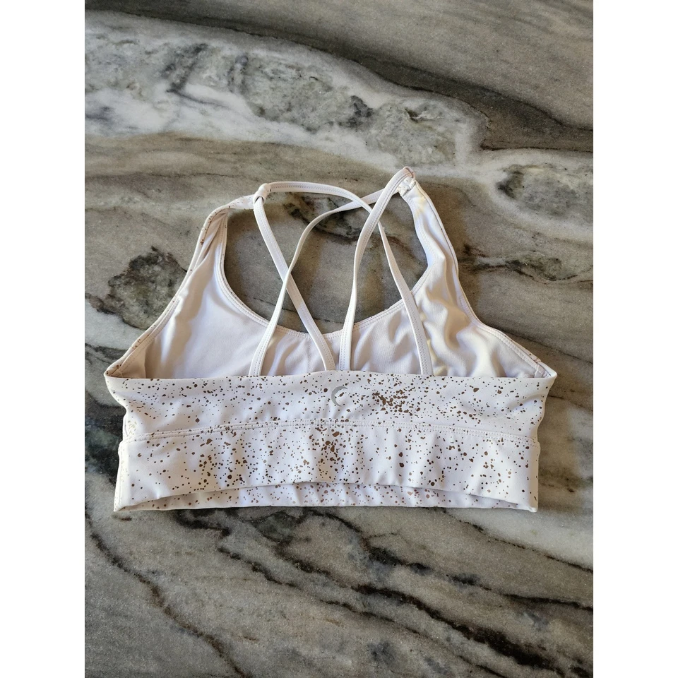 Sujetador deportivo ZYIA blanco Stay dorado claro y apretado con tiras mediano - sin almohadillas Foto 4 de 4