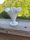 Vintage Fenton milk glass hobnail vase pattern and a delicate ruffled edge. 4”