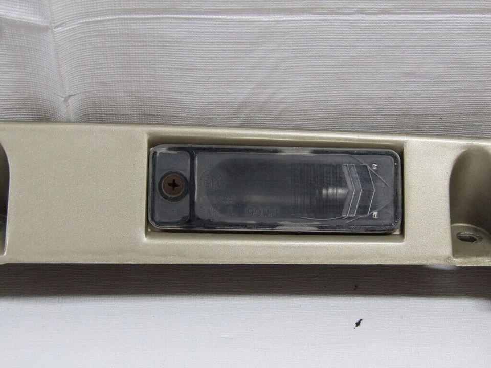 Jeep Grand Cherokee 1999-2004 puerta levadiza escotilla matrícula moldura champán fabricante de equipos originales Foto 4 de 4