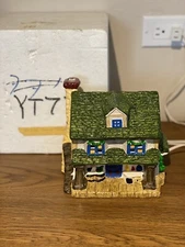 Yuletide “ Home Supply” W/ Beautiful Curve Appeal ceramic lighted house!