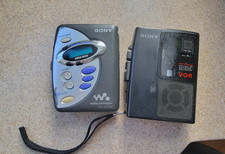 Sony Walkman  Cassette-corder Lot: Powers up. Radio works, for parts or repair