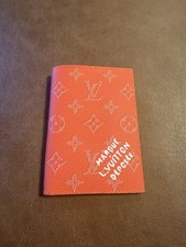 Louis Vuitton pomarańczowy uchwyt na paszport