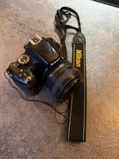 Nikon D5100 16.2MP DSLR with Nikon 50mm AFS