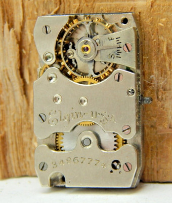 Vintage 1934 Elgin 488  7 jewel wrist watch movement good balance with dial