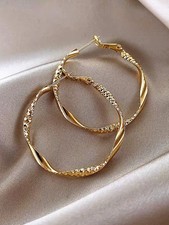 Yellow Gold Textured Twist Hoop Earrings One Size