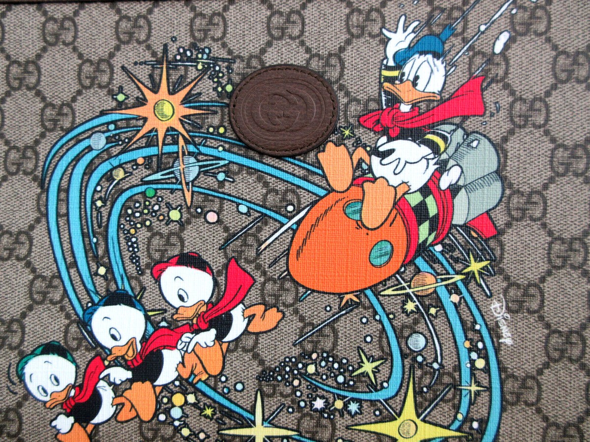 GUCCI Disney Wristlet Clutch Bag Collector's Item GG supreme GUCCI Disney Wristlet Clutch Bag Collector's Item GG supreme