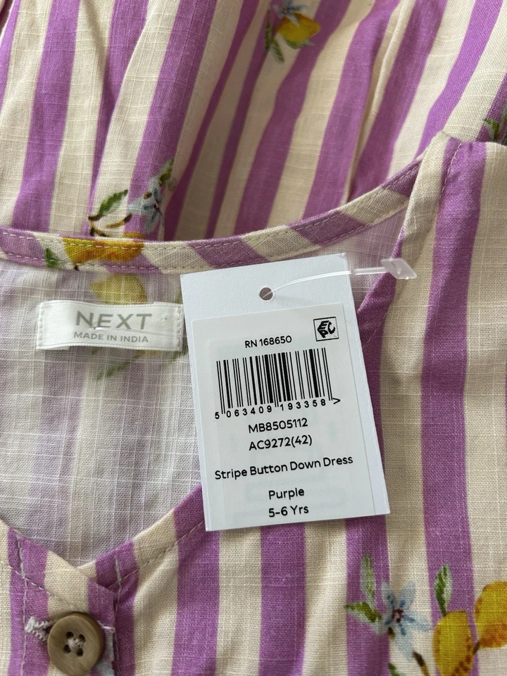 SIGUIENTE Vestido con botones a rayas moradas talla 5-6 para niñas de Nordstroms Foto 3 de 3