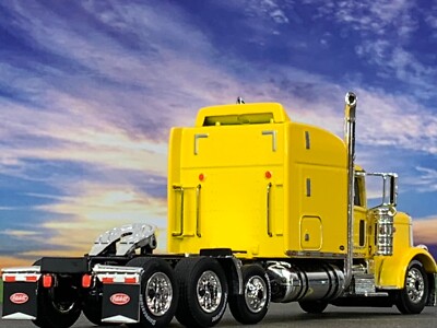 1/64 DCP YELLOW PETERBILT 389 TRI AXLE W/ 63