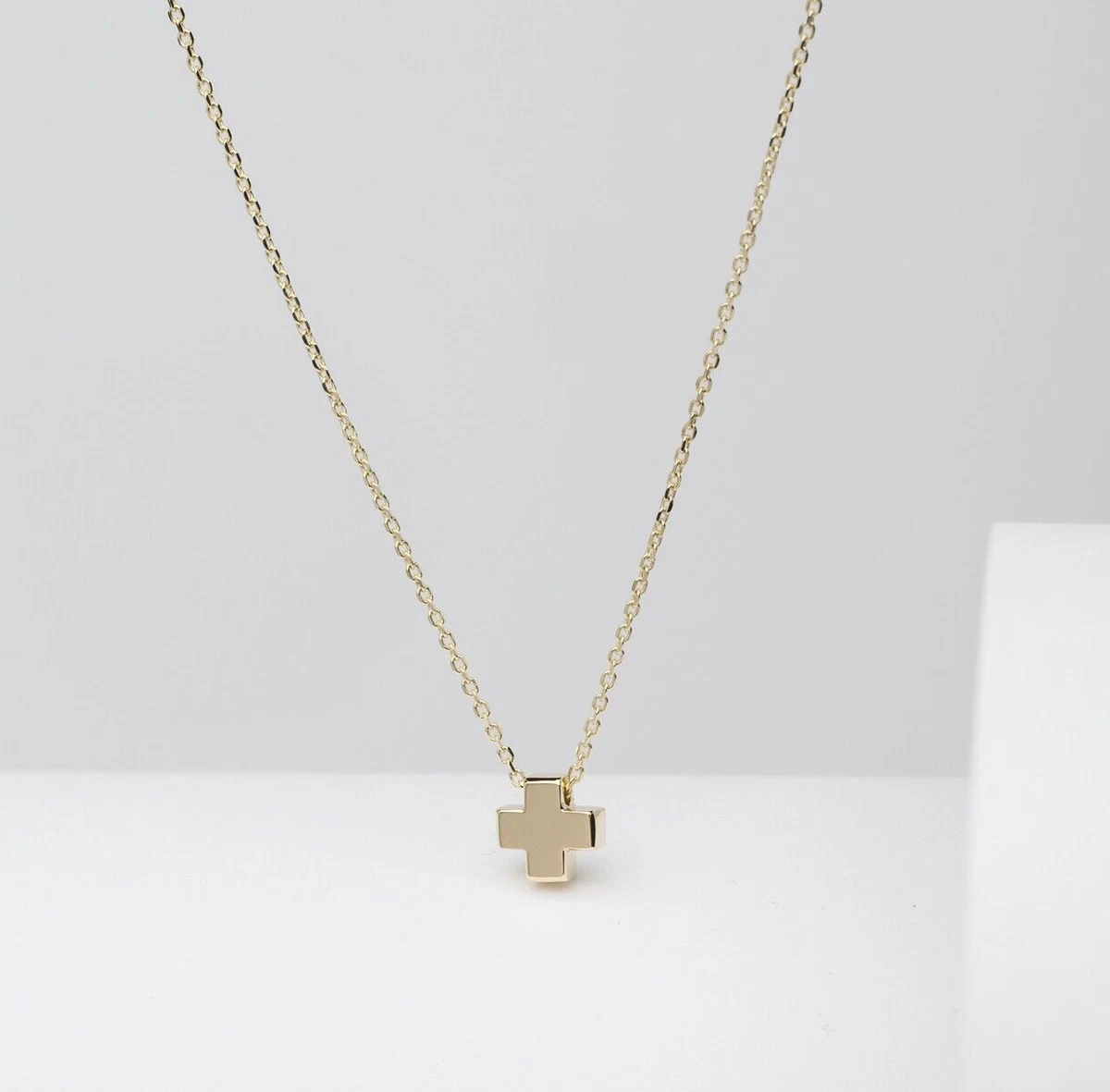 Tiny 14k gold cross deals necklace