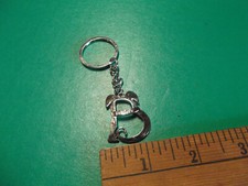 Unique Collectible Key Chain 1.25"in Metal B..Behave  not sure what it says