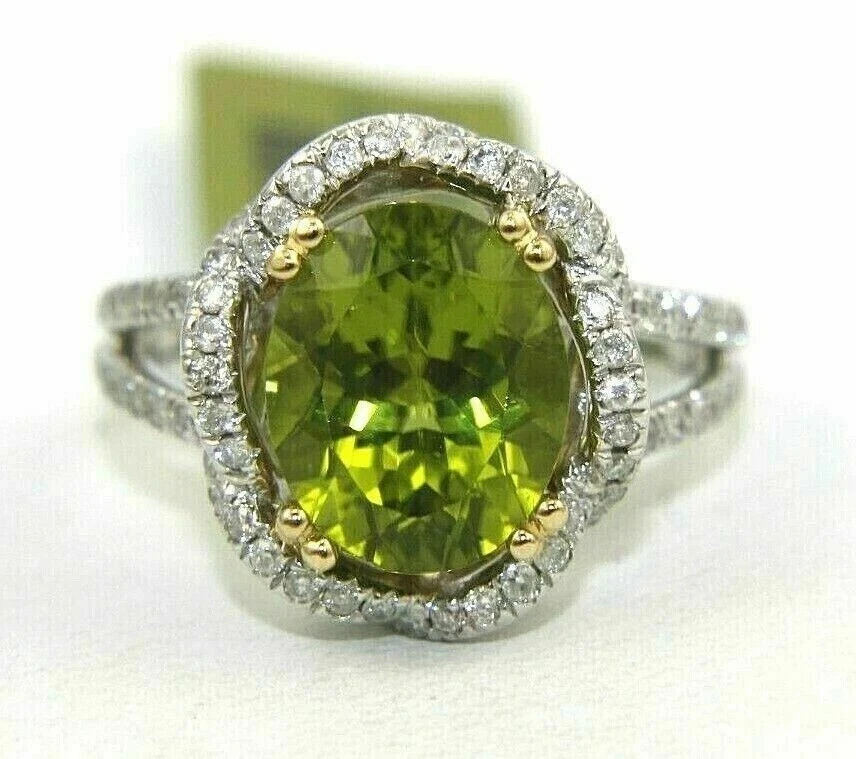 Anillo de compromiso de peridoto verde creado en laboratorio de corte ovalado de 4 quilates acabado dorado de dos tonos de 14 quilates Foto 3 de 3