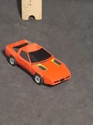 Vintage 1984 TONKA / BANDAI  Go Bots Puzzler Head “Tic Tac” Red Corvette Gobots.