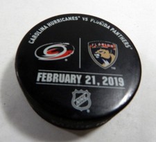 Florida Panthers Vs. Carolina Hurricanes Game Used Black Warm Up Puck DP61387
