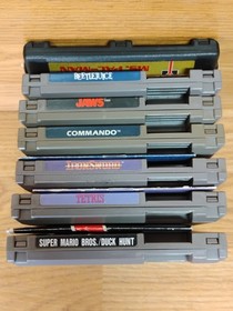 NES Lot Of 7 Games & Game Genie - Beetle Juice, Mario Duck Hunt, Jaws, Tetris 