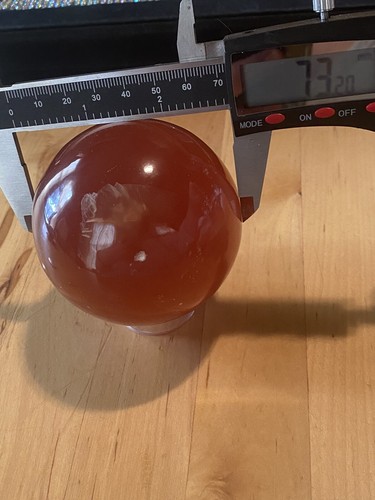 Schöne 73 mm Honig/Bernstein Calcit Kugel, 564 Gramm, (Krone/3. Auge Chakra) - Bild 9 von 10