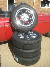  4 TRIUMPH 2000 2500 STAG  5.5 X 15 GREY  POLISHED  RIM ALLOY WHEELS & TYRES