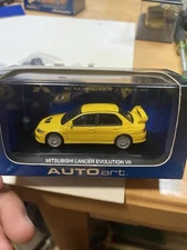 1/64 Autoart Mitsubishi Lancer Evolution VII (Yellow) Diecast toy 