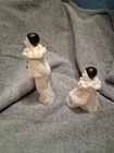 Vintage Avon Pierrot clown milk glass decanter set. Includes both the standing a