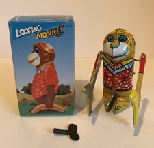 Vintage Wind Up Tin Toys Looping Monkey With Box Works