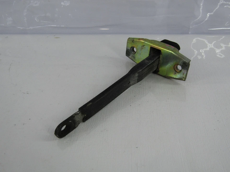 Limitador de tope de retención de puerta delantera izquierda Toyota Land Cruiser 1991-1997 OEM Foto 4 de 4