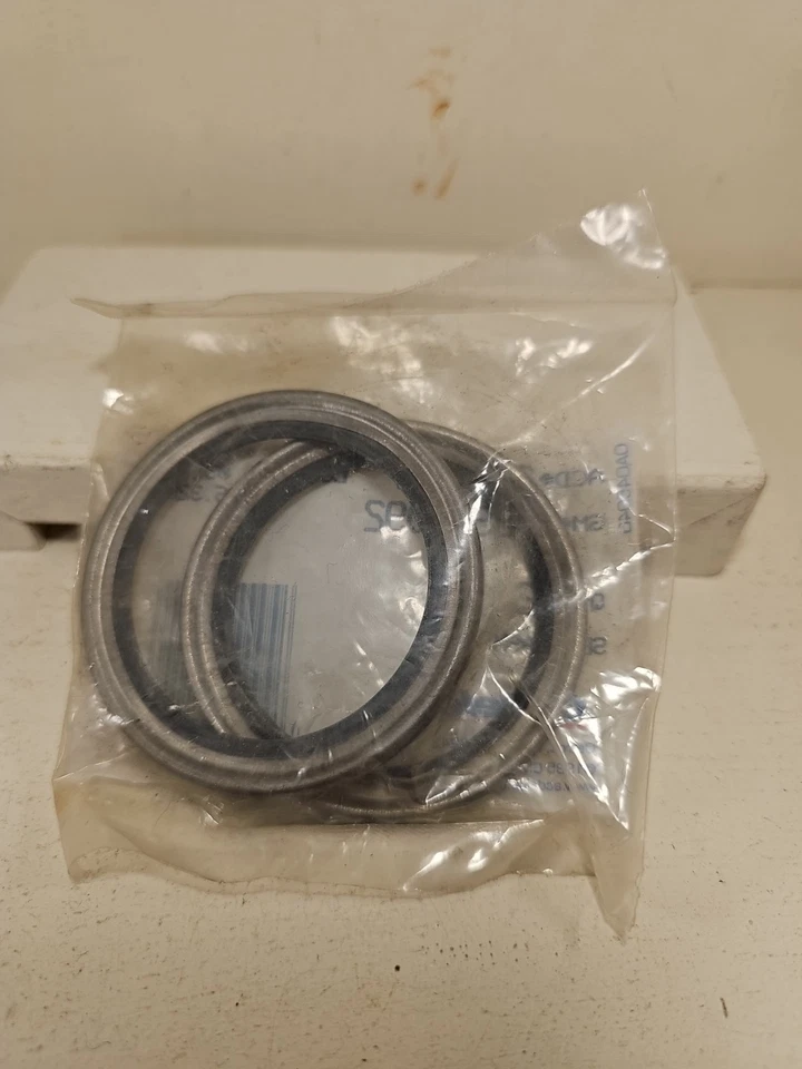 LOTE DE 2 SELLOS DE RUEDA NOS OEM GM 3965092 ACDelco GMC Chevy Buick Foto 2 de 2