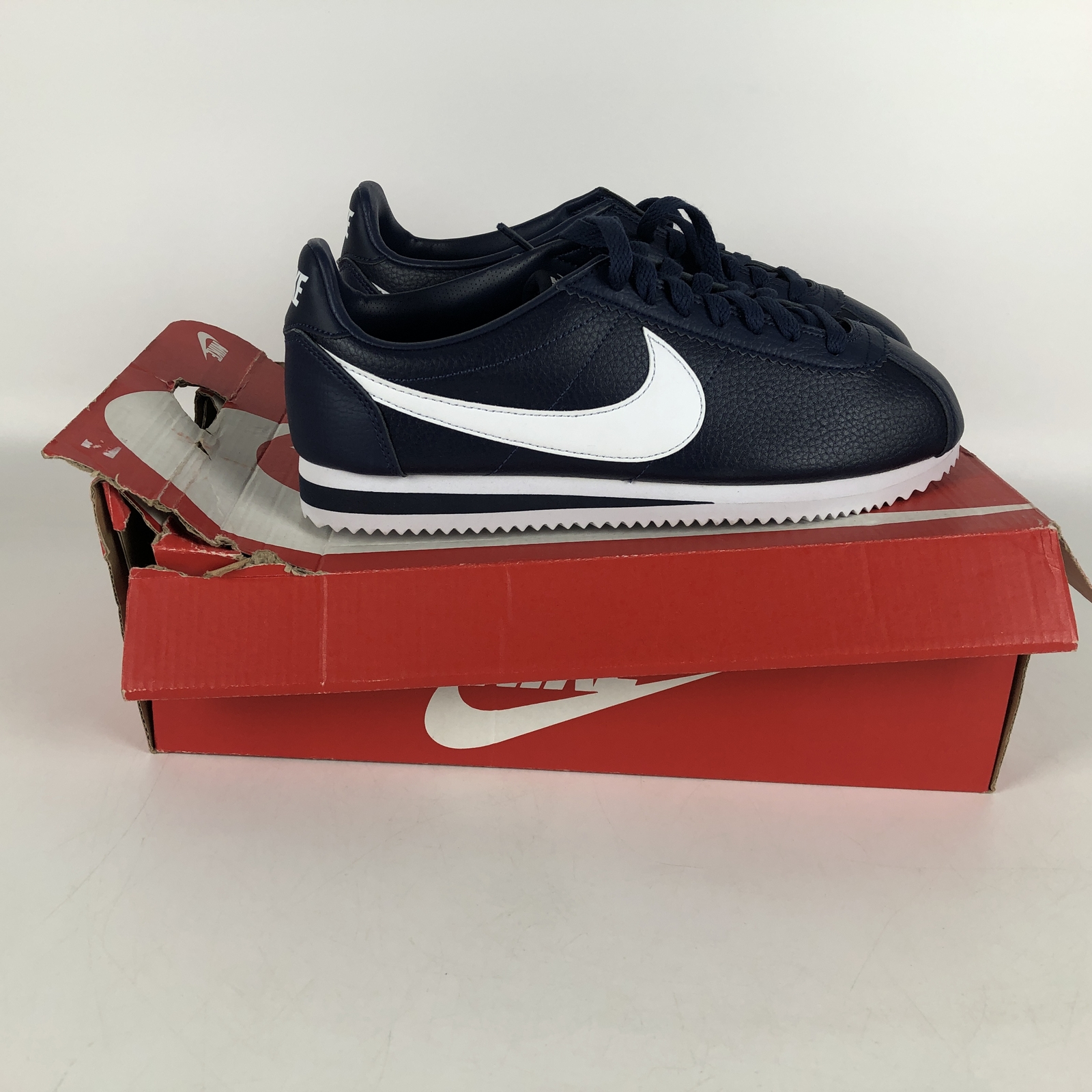 nike roshe cortez gold