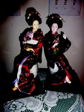 LOT OF 2  BISQUE & CLOTH CHINESE DOLLS ON STANDS WITH FAN