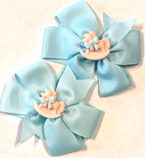 Beautiful Rocking Horse inspired set of pigtail bows for girls.