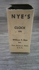 advertising Nye's clock oil for your clocks around the house in original box