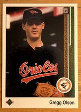 1989 Upper Deck Gregg Olson Rookie Card (RC) #723 Orioles OF Mid-Grade EXMT O/C. rookie card picture