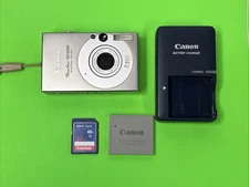 Canon PowerShot Digital ELPH SD1000 7.1MP Digital Camera Silver TESTED WORKING✅