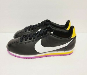 nike cortez orange and black