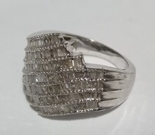 Very attractive sterling silver cocktail ring - multirow baguette cut crystals