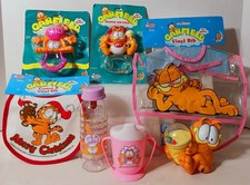 7 GARFIELD Baby Girl BOTTLE Training Cup CHRISTMAS BIB Rattles vintage lot nos