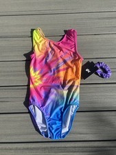 NWT GK Elite Sz AM Gymnastics Leotard Light Blue/Pink/ Multi Burst MSRP 34.99