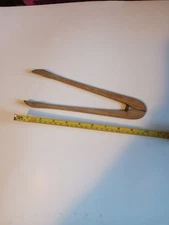 Vintage wooden tongs
