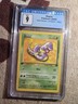 Pokemon Ekans Team Rocket - 1st Ed. 56/82 CGC Mint 9